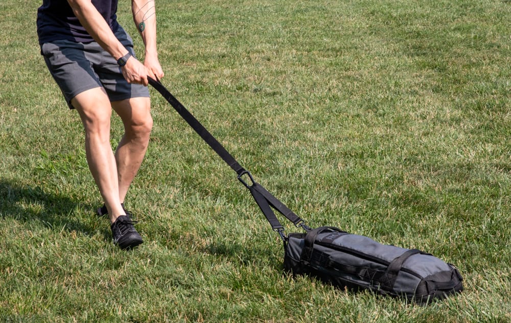 Sandbag sled outlet drag